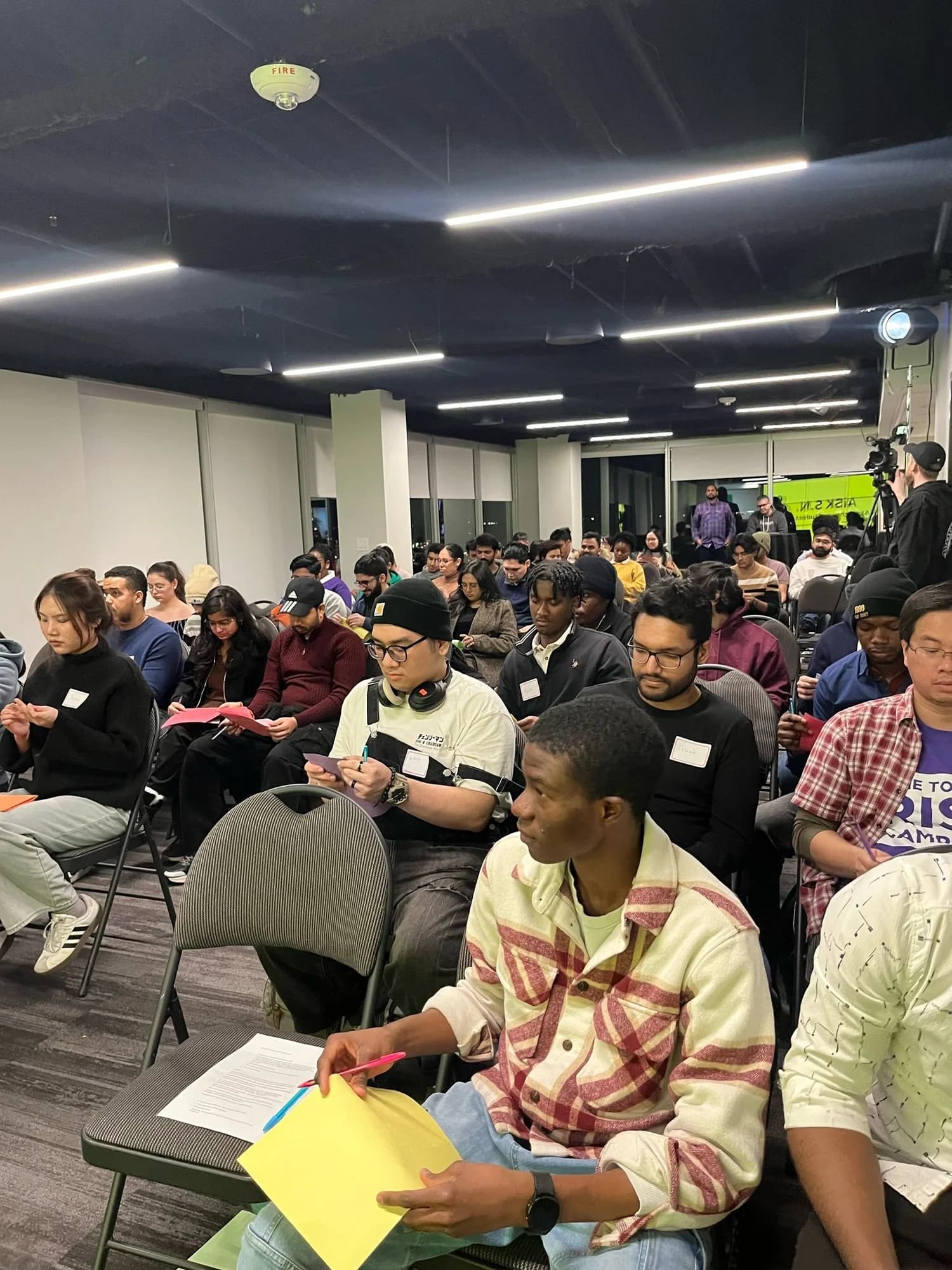 Students networking at an AiSK evening event
